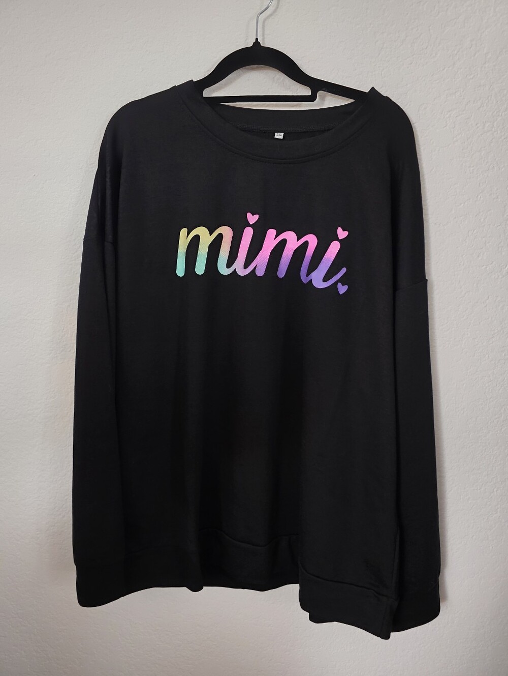 NWOT Mimi Black Long-Sleeve Graphic Top